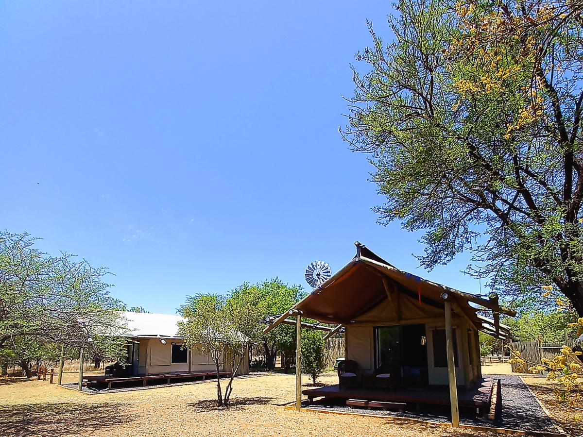 Luxury Safari Tent exterior with veranda at Sun Acres Farm