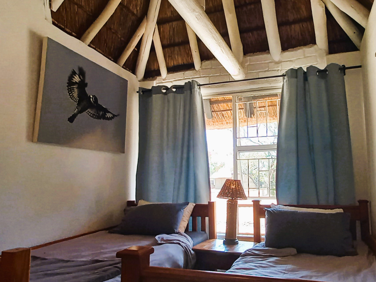 Rock Cottage bedroom with two single beds for family guests