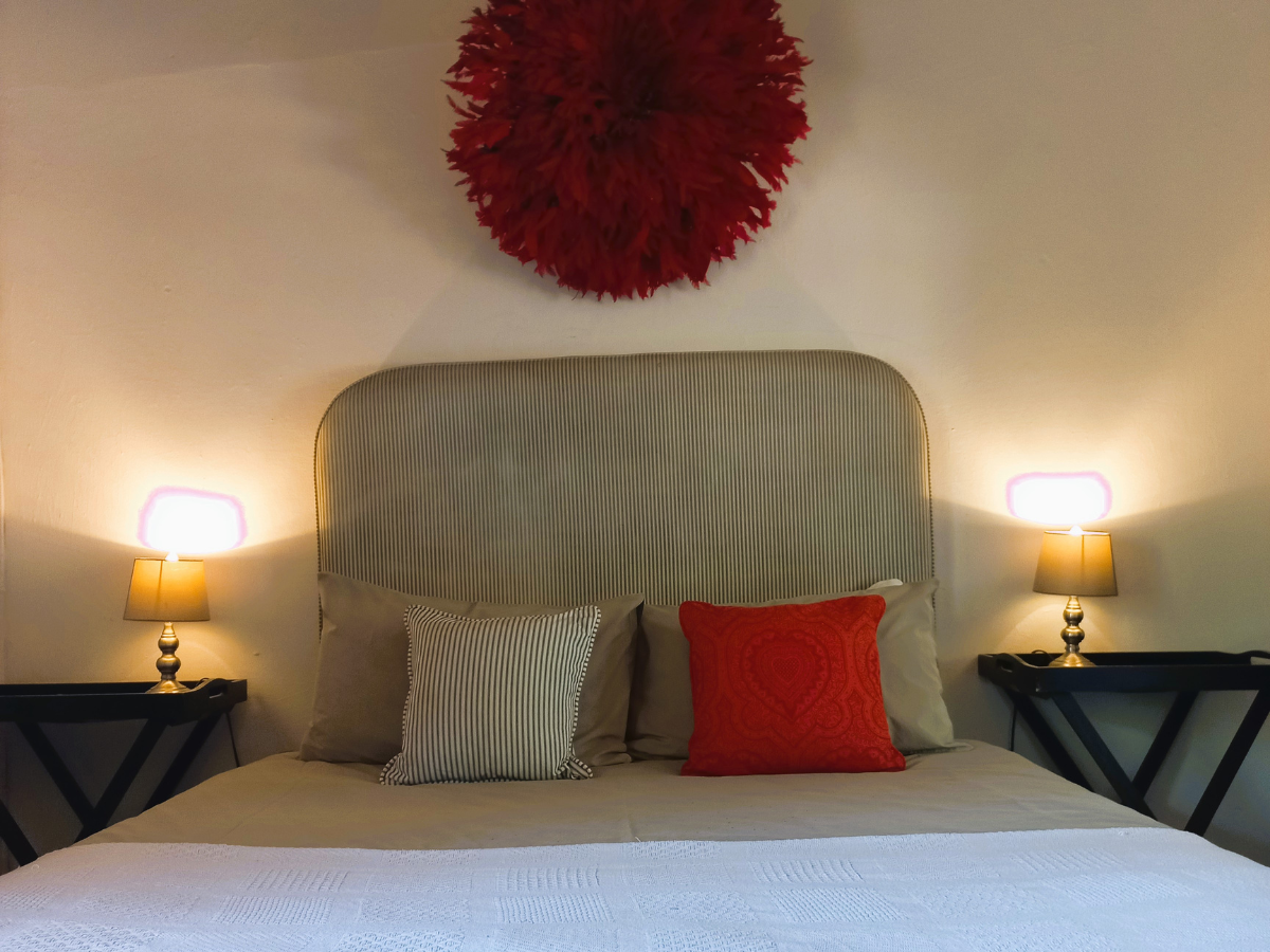 Archies Cottage bedroom with queen bed and en-suite bathroom