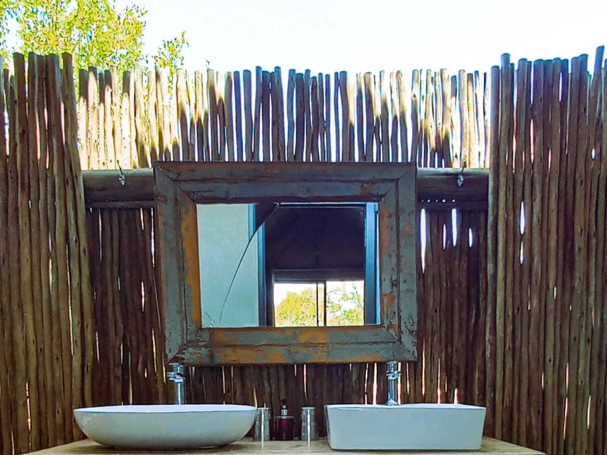 Luxury Safari Tent semi-outdoor bathroom with double sink